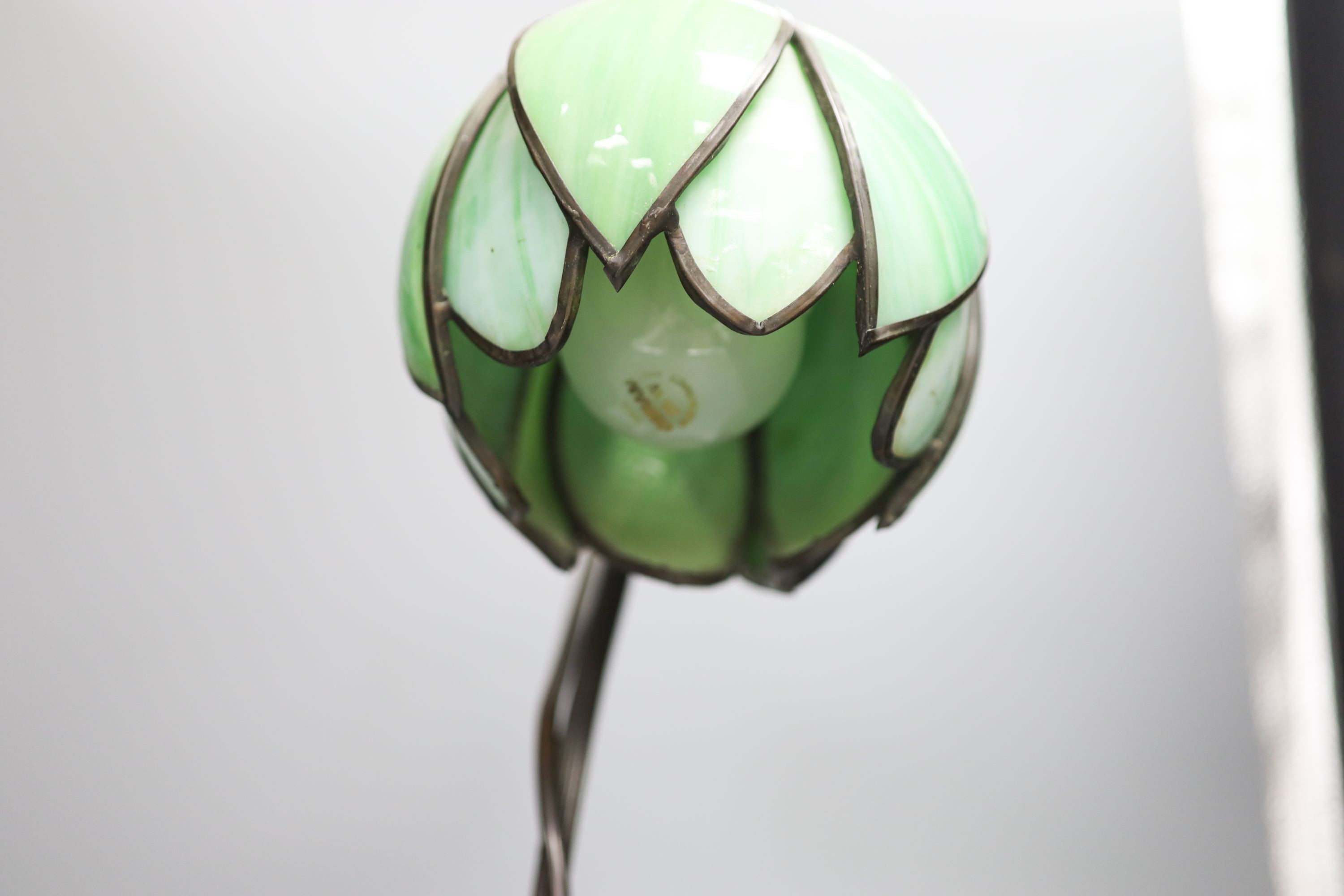 A Tiffany style metal and glass lamp 43cm